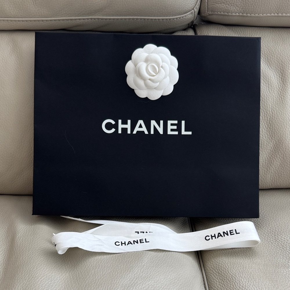 Authentic Chanel shopping Bag with Camilla sticker